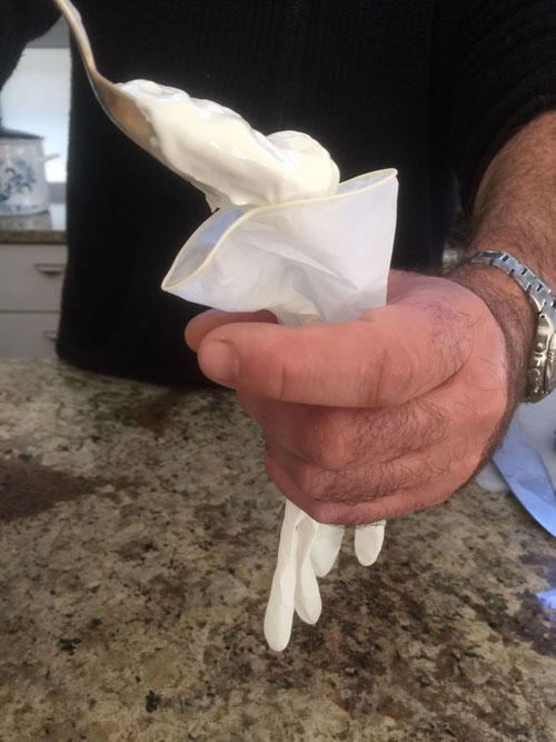 Filling disposable gloves with Yogurt